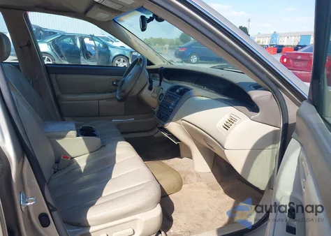 2003 Toyota Avalon Xl z USA, uszkodzony, nr VIN 4T1BF28B73U336455